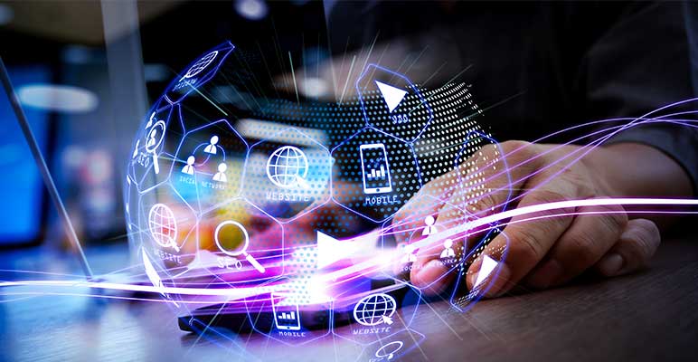Collage of technology signs and symbols surrounding a businessman&rsquo;s hand intended to represent digital marketing media.