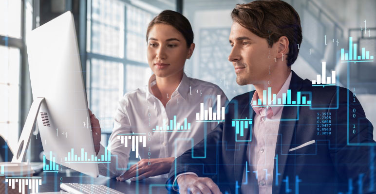 Photograph of female and male sitting at desk looking at computer screen with upward and downward trending bar graphs superimposed on the photo.